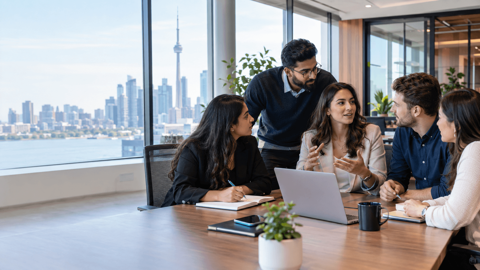 Professionals collaborating in a modern Canadian workspace